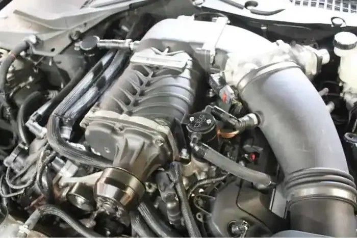 J&L 11-17 Ford Mustang GT (w/Roush/VMP Supercharger) Driver Side Oil Separator 3.0 – Black Anodized